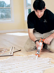 Using Bostik adhesive to install wood floor medallions Using adhesive to install wood floor medallions