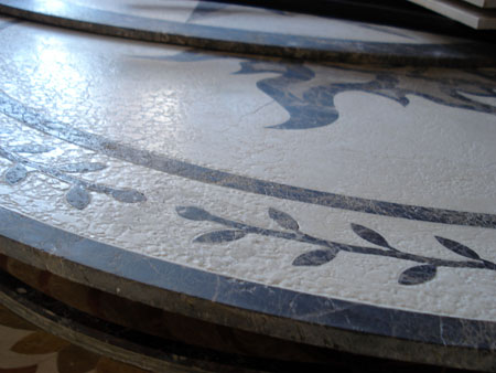 treated stone medallion with tumbled, brushed style Treated Tumbled stone medallion