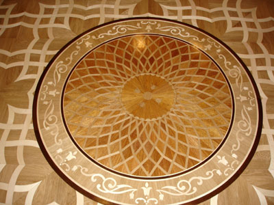 The result of wood medallion installation in parquet. ADEX Award winning design Maya The result of wood medallion installation in parquet. Award winning design Maya