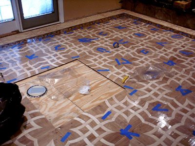 Preparation for medallion installation into parquet floor. Opening left in parquet for cutting Preparation for medallion installation into parquet floor